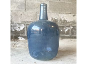 A Large Vintage Glass Wine Bottle