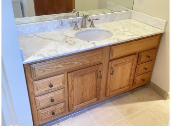 A Solid Oak And Marble Bathroom Vanity