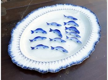 A Large Fish Platter And Ceramic Fish Place Card Holders