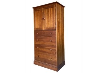 A Cherry Wood Cabinet By Ethan Allen