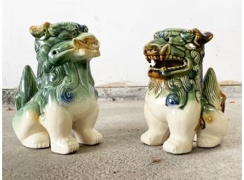 A Pair Of Antique Ceramic Foo Dogs
