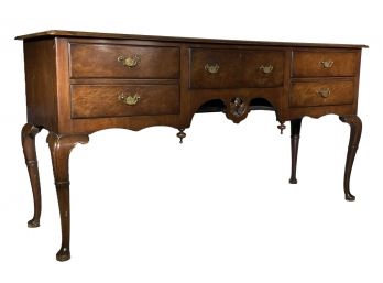 An Antique Carved Mahogany Traditional Sideboard
