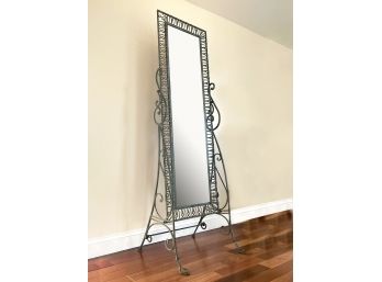 A Whimsical Wrought Iron Chevel Mirror