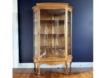 An Early 20th Century Oak Curved Glass China Cabinet