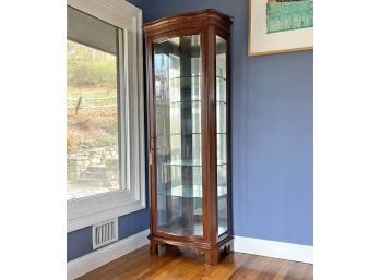 A Lighted Curio Or China Cabinet