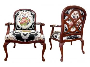 A Pair Of Upholstered Arm Chairs By Baker Furniture