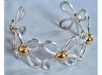 Contemporary Silver Tone Flower Link Cuff Bracelet With Gold Tone Accents