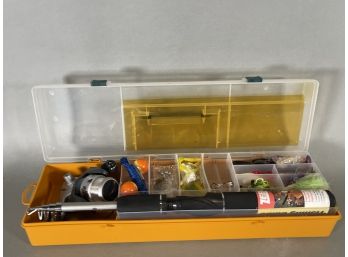A Tackle Box With Zebco Reel And More