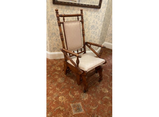 An Antique Eastlake Rocking Chair With Upholstered Seat.