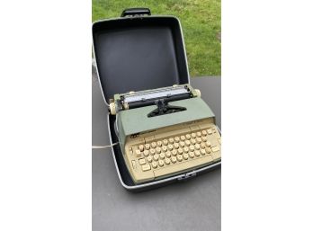 A Vintage Smith-Corona SCM Classic Coronet Electric Portable Typewriter With Hard Case