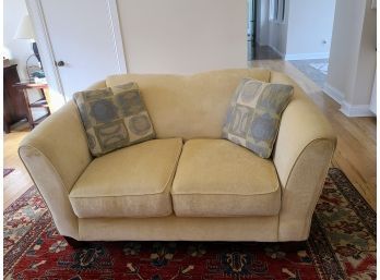 Cream Color Two Seated Couch By Ashley Furniture
