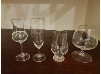 A Selection Of Small Glasses Brandy, A Heineken Beer Total Of