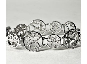 Fine Sterling Silver Circular Linked Bracelet Having White Stones Hand Set