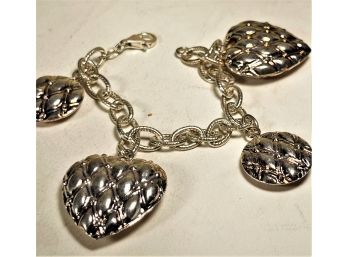 Contemporary Sterling Silver Heart Shaped Charm Bracelet