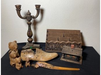A GROUPING OF CARVED WOODEN ITEMS