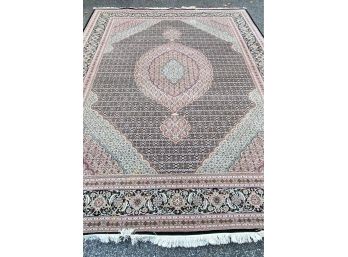 A  Vintage Hand Knotted Black, Cream, Tan, Pink  & Blue Area Rug With Fringe - Approximately 109'w X 147'long