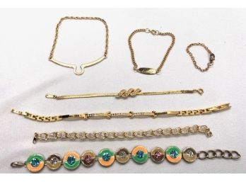 7 Goldtone Bracelets Including Rhinestone Detail