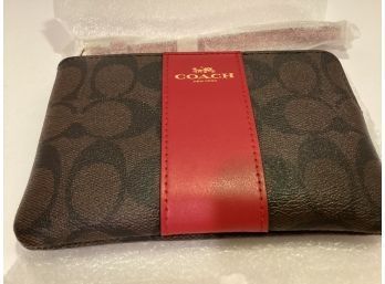 Authentic Signature Coach Zipped Leather Pouch With Strap  (NEW)