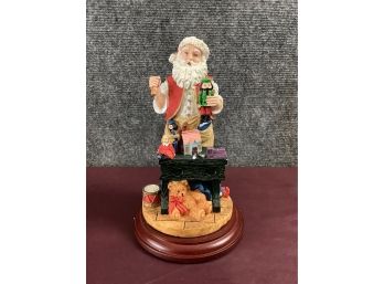 Santa In Toy Shop Figurine