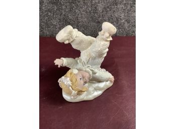Baby Playing In Snow Figurine