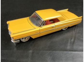 Jada Toys Yellow 1963 Cadillac Series 62 Diecast Car (scale 1:24)
