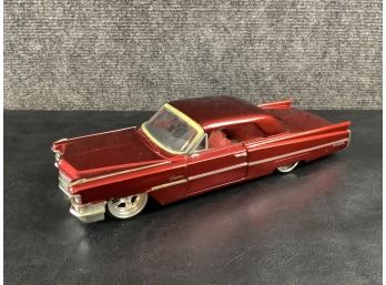 Jada Toys Red 1963 Cadillac Series 62 Diecast Car (scale 1:24)