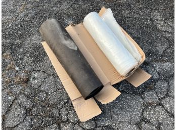 Roll Of Roofing And Roll Of Plastic