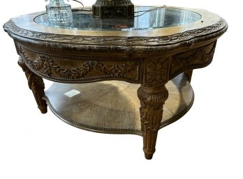 Carved Wood And Glass Coffee Table
