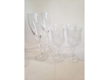 Pair Of Crystal Champagne Flutes And Four Wine Goblets