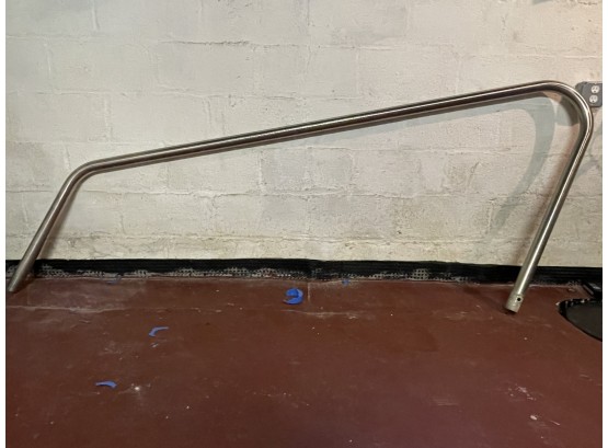 A Swimming Pool Ladder And Handrail