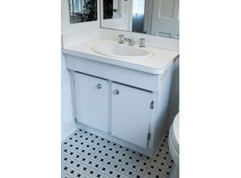 A Laminate Vanity With American Standard Drop In Sink - Bath 2B