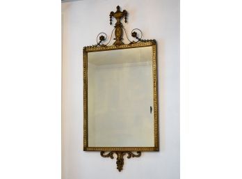 A French Empire Style Gilt Leaf And Urn Motif Wall Mirror