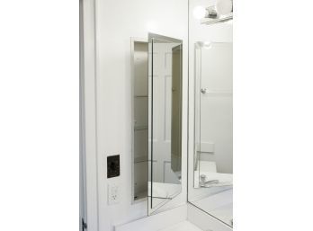 A NuTone Brand Mirrored Medicine Cabinet - Bath 2B