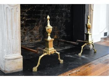 A Pair Of Brass Andirons