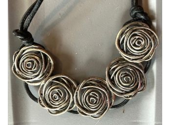 Necklace Of Silver Tone Entwined Circles On Braid