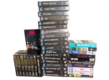 Collection Of VHS Tapes, Including Star Wars And Cosmos.