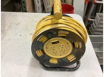 4 Outlet 100ft Extenion Cord With Integrated Reel Assembly To Store The Cord Good Working Order See Pictures