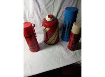 Four Vintage Thermos Bottles