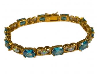 Gold Over Sterling Silver Bracelet Having Blue Topaz And Opal Stones