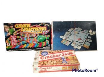 LOT OF 3 BOARD GAMES, MONOPOLY, CRACKER JACK & CHAIN LIGHTNING DOMINO SUPER SHOW