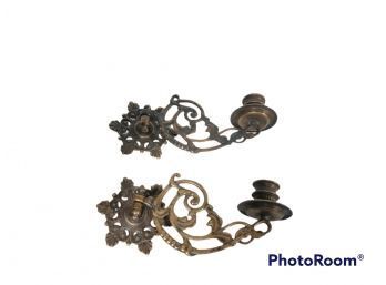 PAIR OF ANTIQUE BRONZE COLORED WALL MOUNTED CANDLE STICK HOLDERS