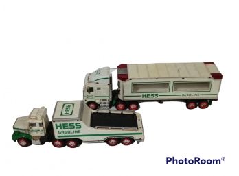 PAIR OF HESS TOYS, FLAT BED TRUCK, & SEMI GASOLINE TRUCK