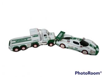 PAIR OF HESS TOYS, FLAT BED TRUCK 7 RACE CAR