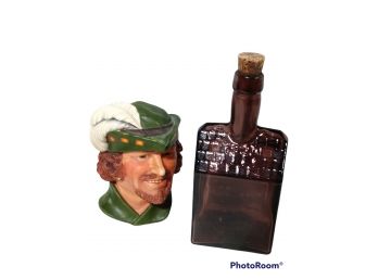 ROBIN HOOD LEGENDS PRODUCTS ENGLAND CHALKWARE HEAD SIGNED BY F. WRIGHT 1985 & OLD CABIN WHISKEY BOTTLE PURPLE