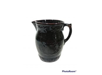 HANDMADE STONEWARE PITCHER WITH EMBOSSED DESIGN UNDER THE GLAZE 8' TALL