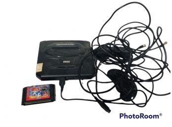SEGA GENESIS SYSTEM WITH GAME  UNTESTED