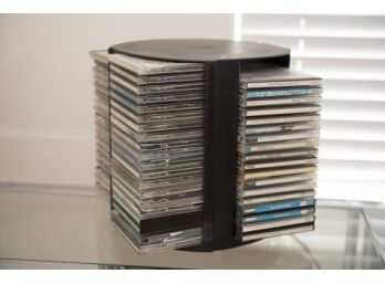 Collection Of CD's On Swivel Stand