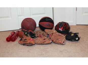Lot Of Sporting Goods Baseball Gloves, Basketballs And Paint Ball Tubes
