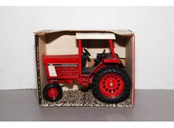 ERTL International 886 Tractor With Safety Frame 1/16 Scale