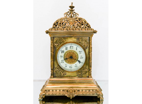 Ornate Brass Mantle Clock With Porcelain Face